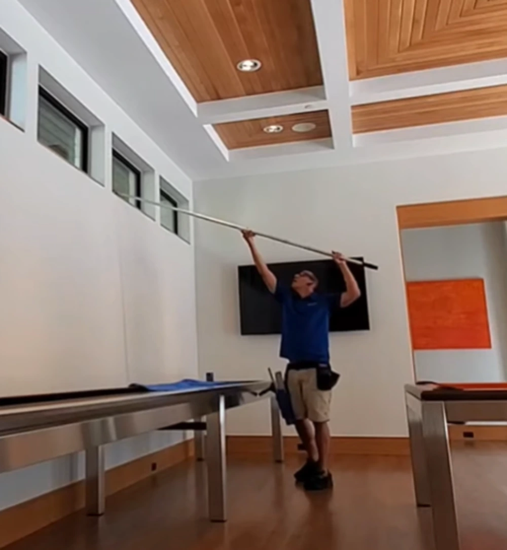 Window cleaning Santa Cruz: cleaning high interior windows extension pole