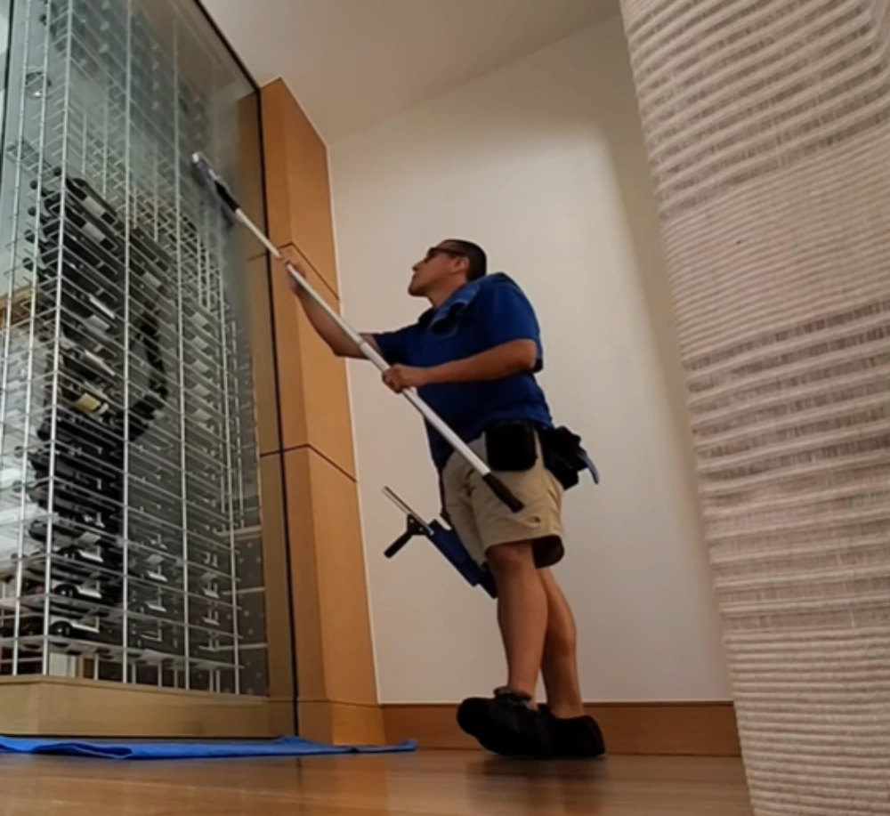 Window cleaning Santa Cruz: extension pole cleaning glass wine room