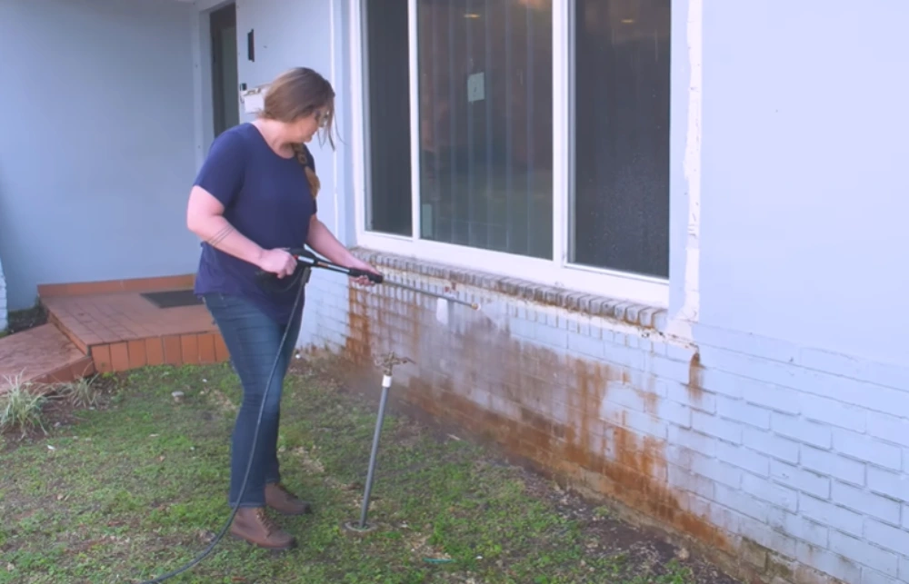 Pressure washing sprinkler rust stains