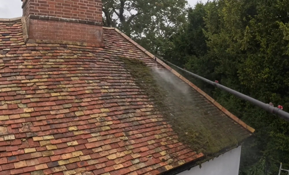 Moss removal on a tile roof