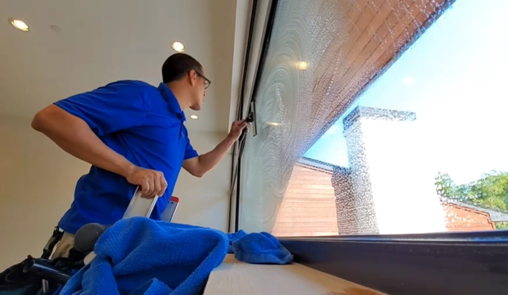 Soapy picture window squeegee interior