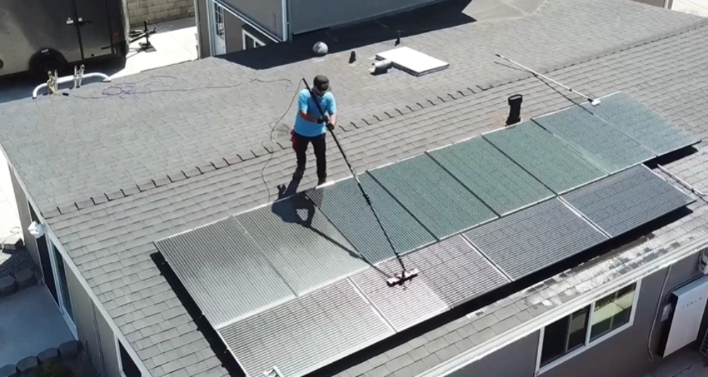 Solar panel cleaning shingle roof pole