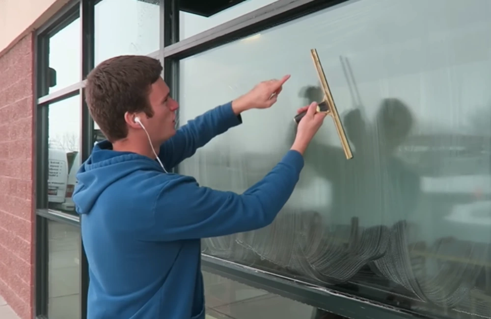 Squeegee angle demonstration window cleaning
