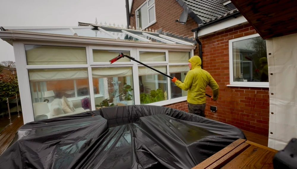 Water-fed pole cleaning conservatory roof