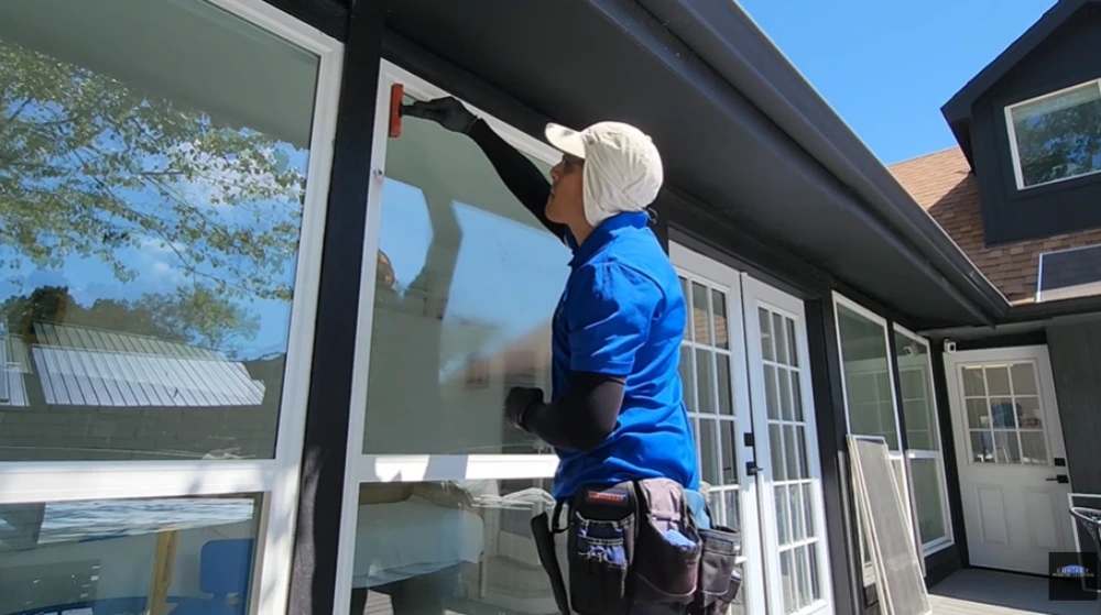 Squeegee across the top of a picture window, window cleaning Santa Cruz County